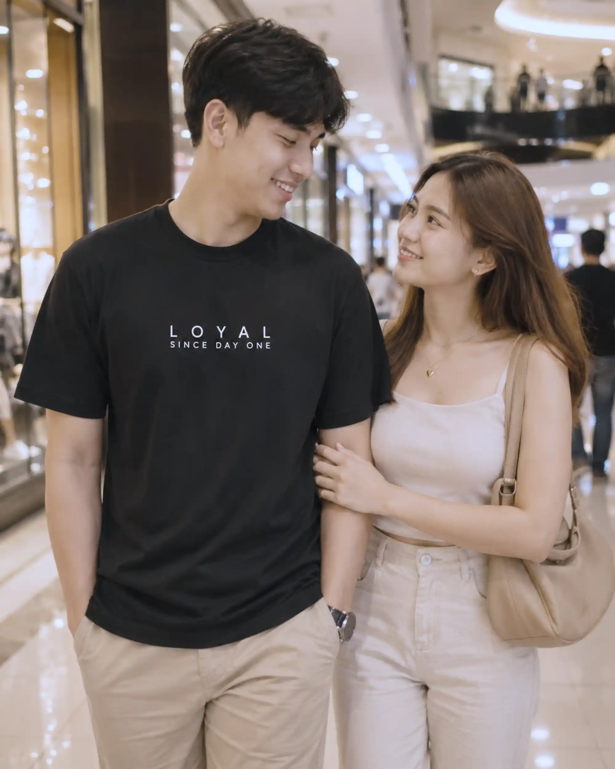Boyfriend wearing a loyal boyfriend shirt during a casual mall date_wp