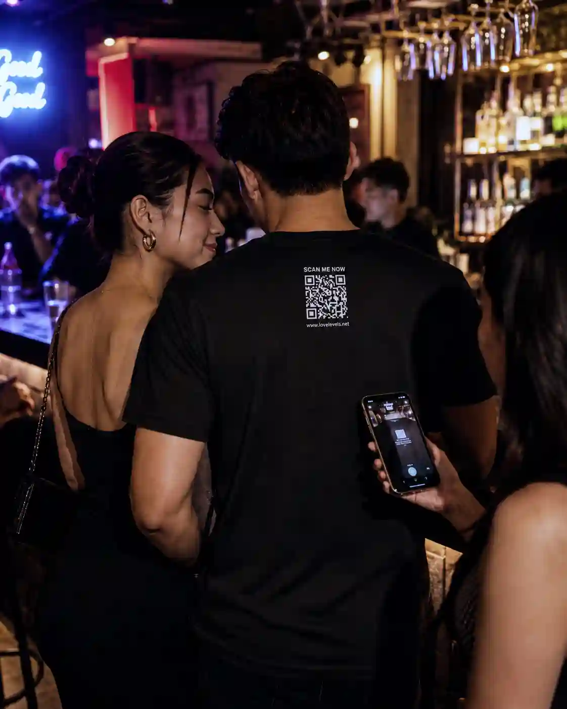 Filipino man wearing LoveLevels QR shirt in a Manila bar WP Filipino man wearing LoveLevels QR shirt in a Manila bar WP